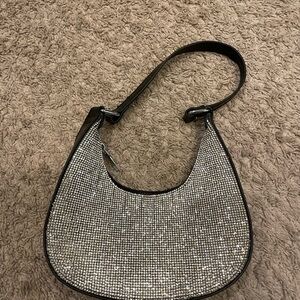 Glittering and sparkling silver black purse